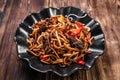 Uyghur cuisine dish tsomyan fried noodles beef Royalty Free Stock Photo