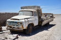 Vintage rusty abandoned Nissan Truck on the edge of the Bolivian Salt Flats. Uyuni, Bolivia, October 11, 2023.