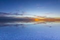 Uyuni reflections are one of the most amazing things that a photographer can see. Here we can see how the sunrise over an infinite