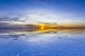 Uyuni reflections are one of the most amazing things that a photographer can see. Here we can see how the sunrise over an infinite