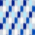 Uzbek ikat silk fabric pattern, indigo blue and white colors Royalty Free Stock Photo