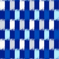 Uzbek ikat silk fabric pattern, indigo blue and white colors Royalty Free Stock Photo