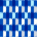 Uzbek ikat silk fabric pattern, indigo blue and white colors Royalty Free Stock Photo