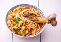 Uzbek noodle soup Lagman with large bone Royalty Free Stock Photo