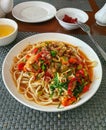 Uzbek traditional national food lagman, soup with noodles, vegetables and meat