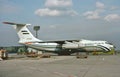 A Uzbekistan Ilyushin IL-76TD UK-76831 on the ramp being loaded .