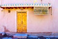 UZBEKISTAN, KHIVA- SEPTEMBER 20, 2015: entrance door of the traditional guest house