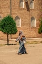 31.05.2021 Uzbekistan.Tashkent islamic women wearing hijabs walk through the bazaar or to prayer