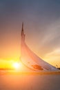 UZBEKISTAN, TASHKENT - MAY 5, 2023: Monument of Independence in the form of a stele with a Humo bird on a sunset in the