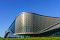 Uzbekistan, Tashkent - September 27, 2023: Building of hotel Hilton on a blue sky background in Tashkent city.