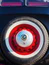 rear close-up of a red bmw 321 oldtimer. spare wheel with mascot on the trunk Royalty Free Stock Photo