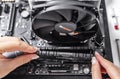 Installing random access memory into PC.