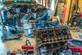 V8 engine from car being rebuilt in garage Royalty Free Stock Photo