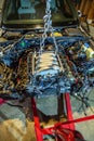 V8 engine out on hoist to get rebuilt Royalty Free Stock Photo