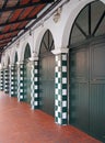 The historic green tiled market building in ciutedalla menorca spain