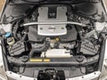 V6 3.5L engine under the hood of a Nissan 350Z