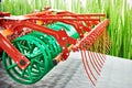 V-ring roller and rows of tines for agricultural