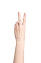 V sign, victory symbol, hand gesture isolated on white background Royalty Free Stock Photo