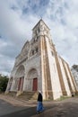 VÃ©zelay Abbey with nun in France, UNESCO heritage