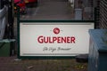 VAALS, NETHERLANDS - NOVEMBER 8, 2022: Gulpener beer logo on a retailer in Vaals. Gulpener is a beer produced by the gulpen