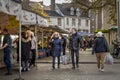 VAALS, NETHERLANDS - NOVEMBER 8, 2022: Selective blur on two dutch people holding together groceries bags, clients, on Vaals