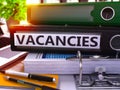 Vacancies on Black Ring Binder. Blurred, Toned Image. Royalty Free Stock Photo