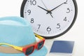 Vacancy concept. Clock, passport and sunglasses