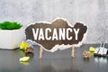 Vacancy word written on wood block. Vacancy text on wooden table for your desing, concept. Royalty Free Stock Photo