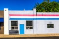 Vacant Building With Red, White & Blue Stripes Royalty Free Stock Photo