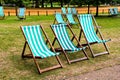 Vacant deck chairs in park