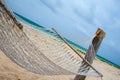 Vacant hammock on a tropical beach Royalty Free Stock Photo