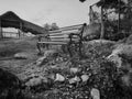 Vacant iron bench on a rocks in Madavoorpara Shiva Rock Temple in Kerala, India.