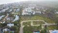 Vacant land next to lush green state park, dense of white painted vacation homes, condo buildings, residential units in Seagrove Royalty Free Stock Photo