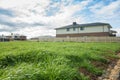 Vacant land next to some residential suburban houses. Melbourne VIC Australia Royalty Free Stock Photo