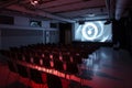 vacant press room with projected logo, no attendees