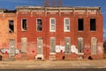 Vacant Row houses with do not enter symbols in East Baltimore