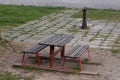 Vacant rustic bench and table in a deserted park