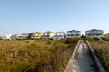 Beach rental cotages on the green sand dunes Royalty Free Stock Photo