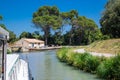 Vacation boat in Canal du Midi, family travel by barge, Southern France Royalty Free Stock Photo