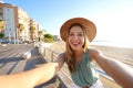 Vacation in Calabria. Selfie girl on Crotone promenade in Calabria, southern Italy