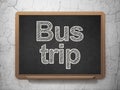 Vacation concept: Bus Trip on chalkboard background Royalty Free Stock Photo