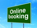 Vacation concept: Online Booking on road sign background Royalty Free Stock Photo