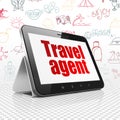 Vacation concept: Tablet Computer with Travel Agent on display Royalty Free Stock Photo