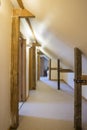 Vacation Cottage Attic Hallway with Wooden Braces