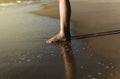 Vacation and holiday concept,Woman leg or foot walking on the beach,Close up