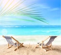 Vacation holidays background concept - two beach lounge chairs under palm on summer beach. Royalty Free Stock Photo