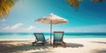 Vacation holidays background wallpaper, two beach lounge chairs under tent on beach. Beach chairs, umbrella and palms on the beach Royalty Free Stock Photo