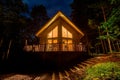 Vacation Home in Woods at Night Royalty Free Stock Photo