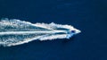 Vacation and leisure. Aerial view on fast boat on blue Mediterranean sea at sunny day. Fast ship on the sea surface. Royalty Free Stock Photo