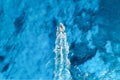 Vacation and leisure. Aerial view on fast boat on blue Mediterranean sea at sunny day. Fast ship on the sea surface. Royalty Free Stock Photo